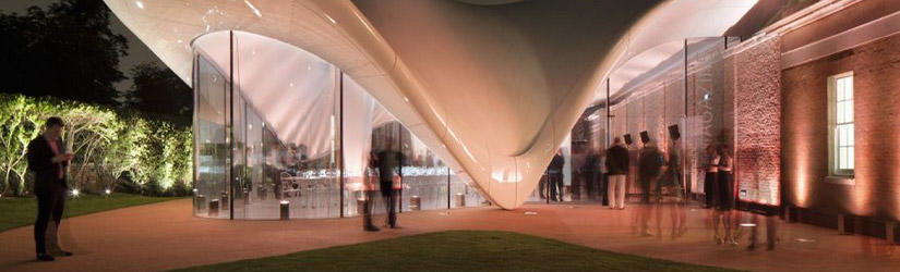 Serpentine Sackler Gallery with a curved, white roof and a massive window front